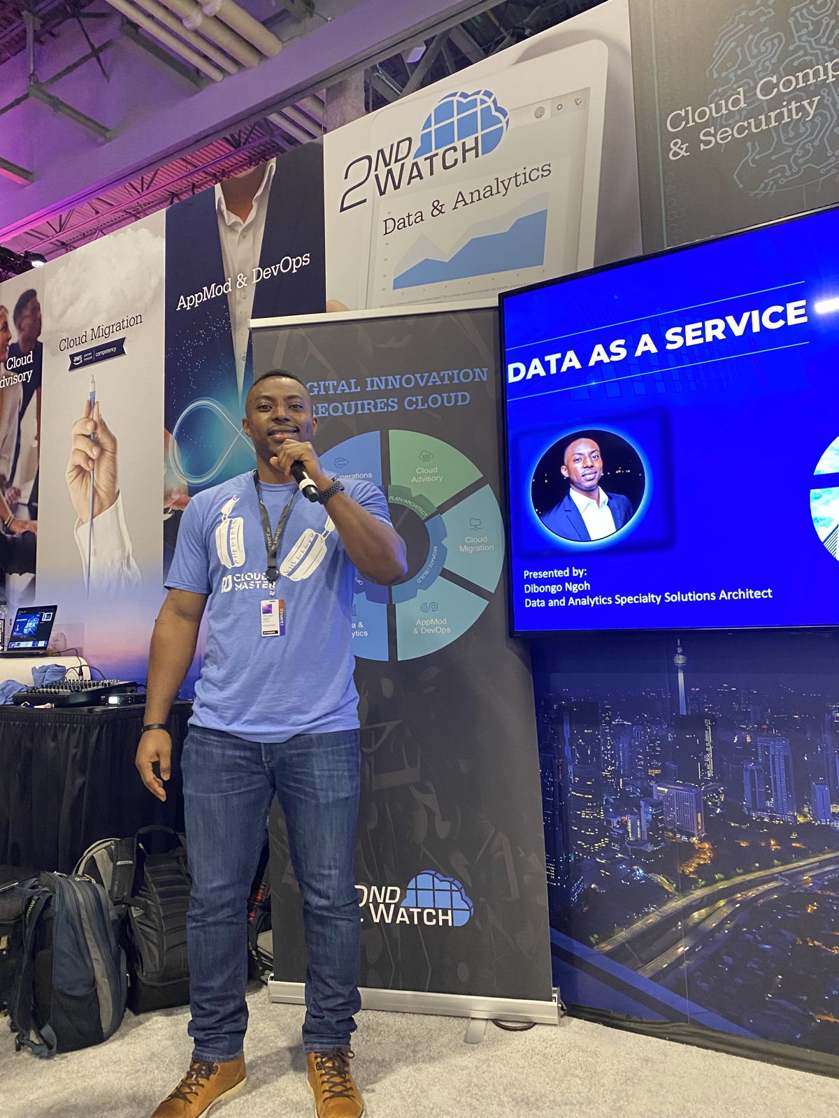 Dibongo Ngoh on stage presenting Data as a Service at AWS re:Invent